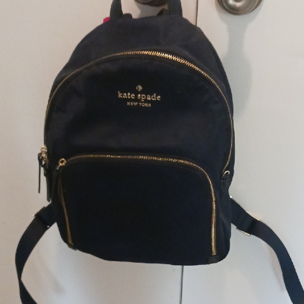 kate spade navy backpack with gold hardware